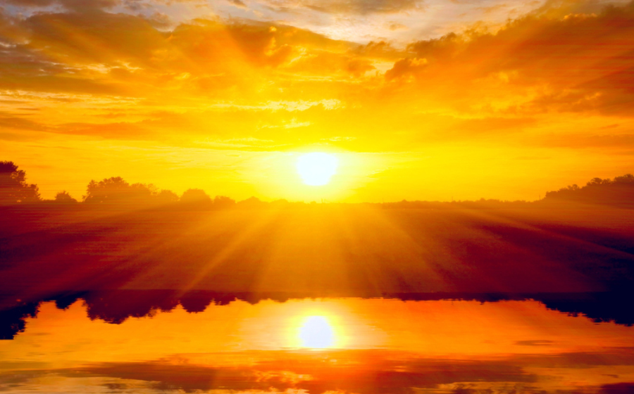 Sunset reflected on water, with the words Through the Eyes of an Educator: Positive Energizers